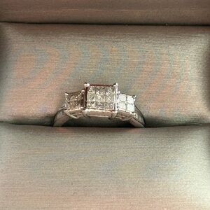 Elegant White Gold Three-Stone Ring